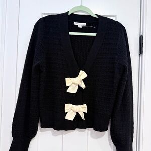 Chic Black Cardigan with Cream Accents
